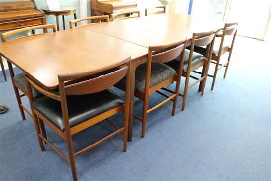 A Mackintosh extending dining table and 8 chairs, 236cm fully extended